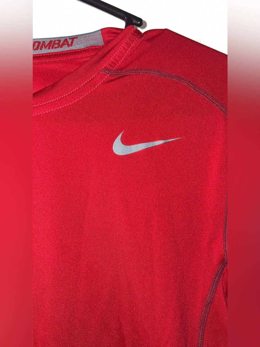 Nike Men’s Red Performance Top with Silver Swoosh
